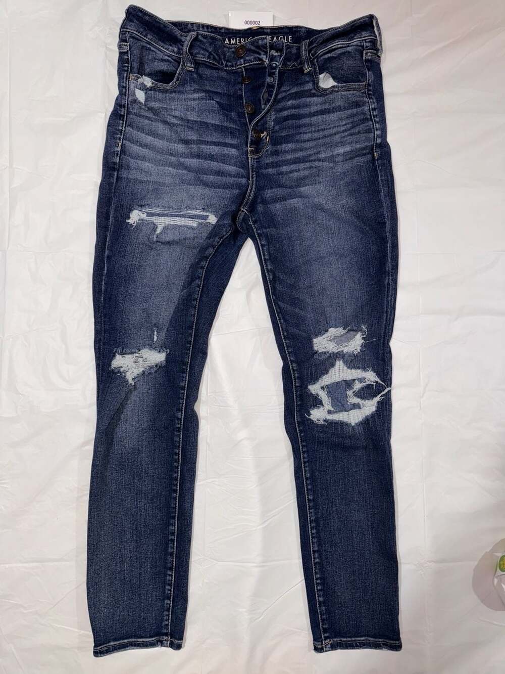 American Eagle Super High Rise Jegging Size 16 Regular Distressed button up